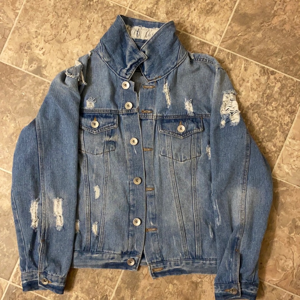 Distressed denim jacket